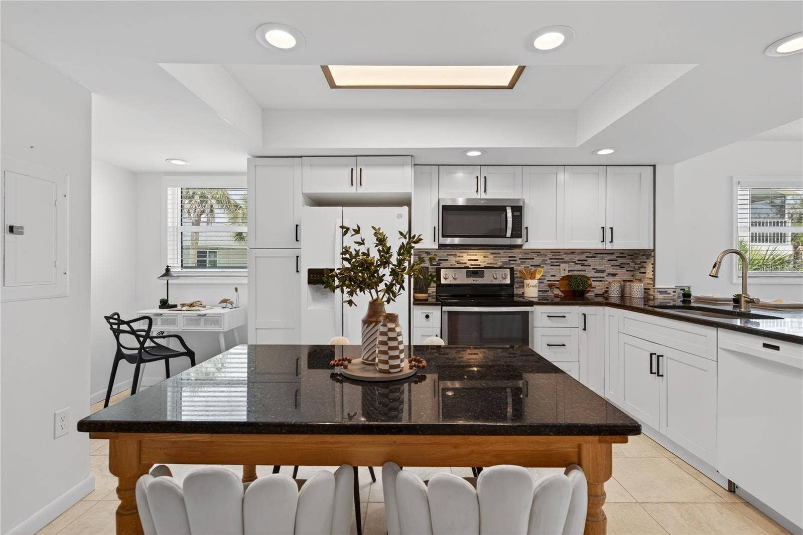5031 N BEACH ROAD, #118, Englewood, FL 34223 Open Plan Kitchen with Office Nook, Granite Counters and Breakfast Bar