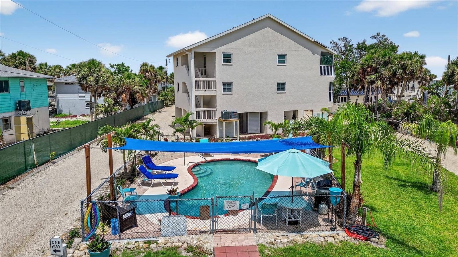 5031 N BEACH ROAD, #118, Englewood, FL 34223 Heated Pool and Barbecue Area