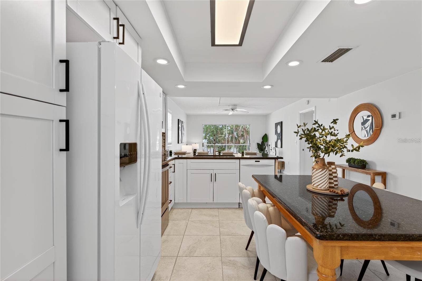 5031 N BEACH ROAD, #118, Englewood, FL 34223 Open Plan Kitchen with Views to the Lanai
