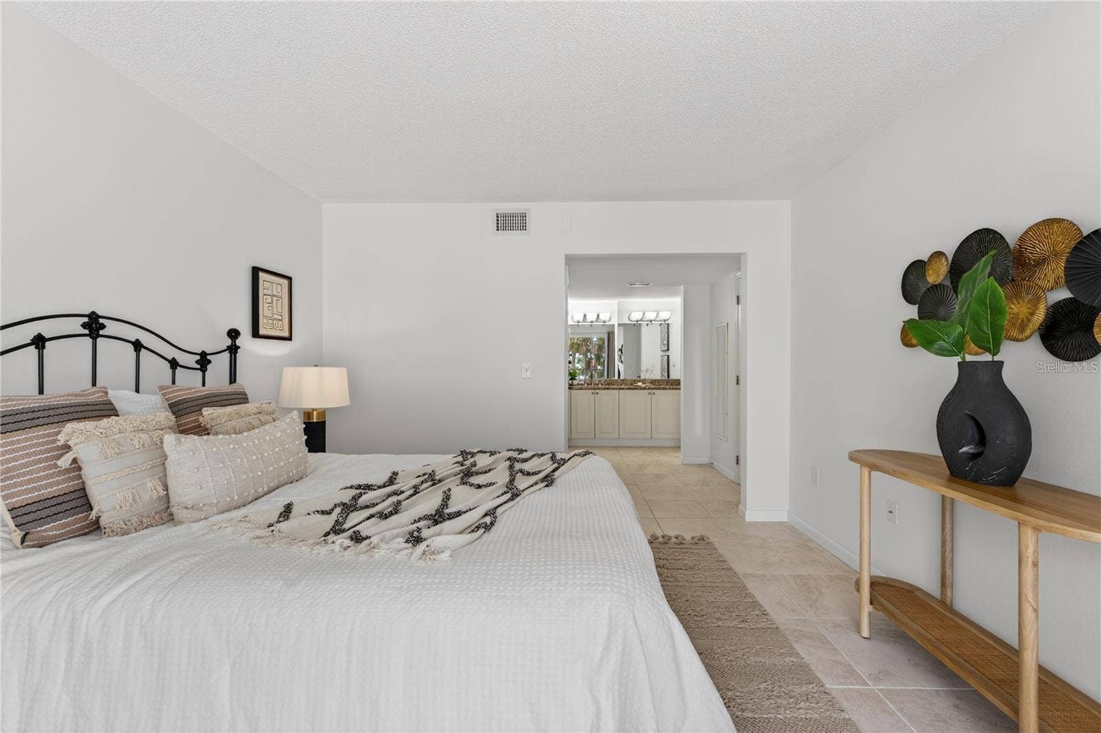 5031 N BEACH ROAD, #118, Englewood, FL 34223 Primary Bedroom with Ensuite Bathroom and Walk-In Closet