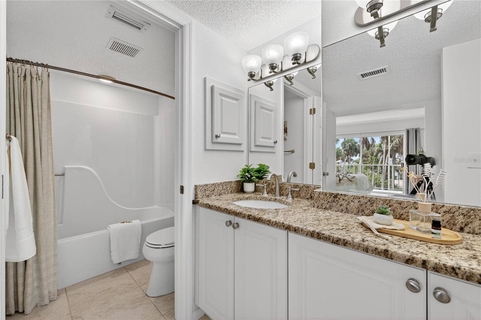 5031 N BEACH ROAD, #118, Englewood, FL 34223 Tub and Shower Combination in Primary Ensuite Bedroom