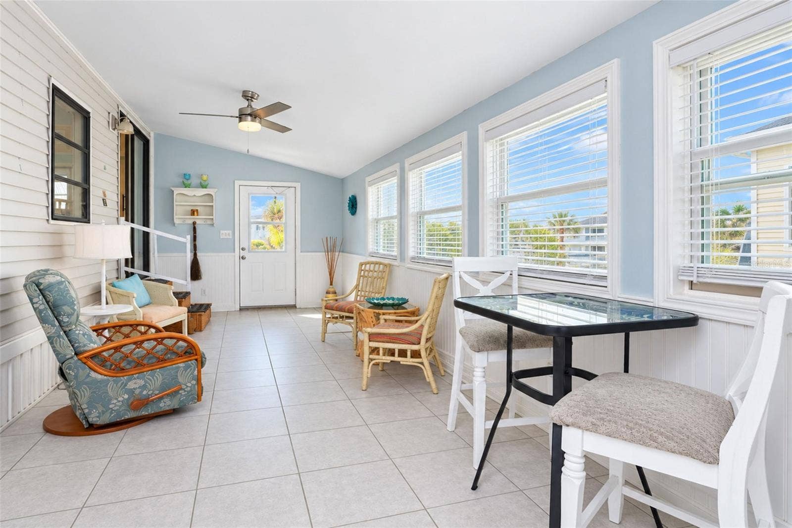 39 CROWN POINT DRIVE, Nokomis, FL 34275 3 season room with tons of natural light