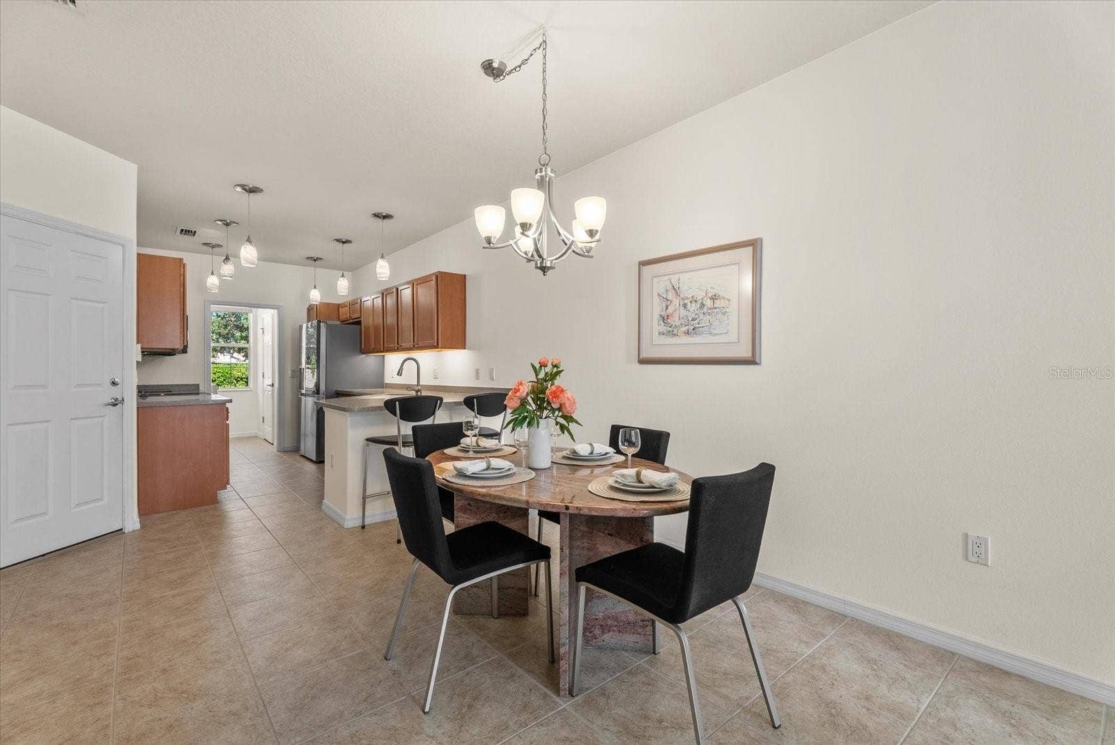 3810 82ND AVENUE CIRCLE E, #104, Sarasota, FL 34243 Dining Room open to Kitchen