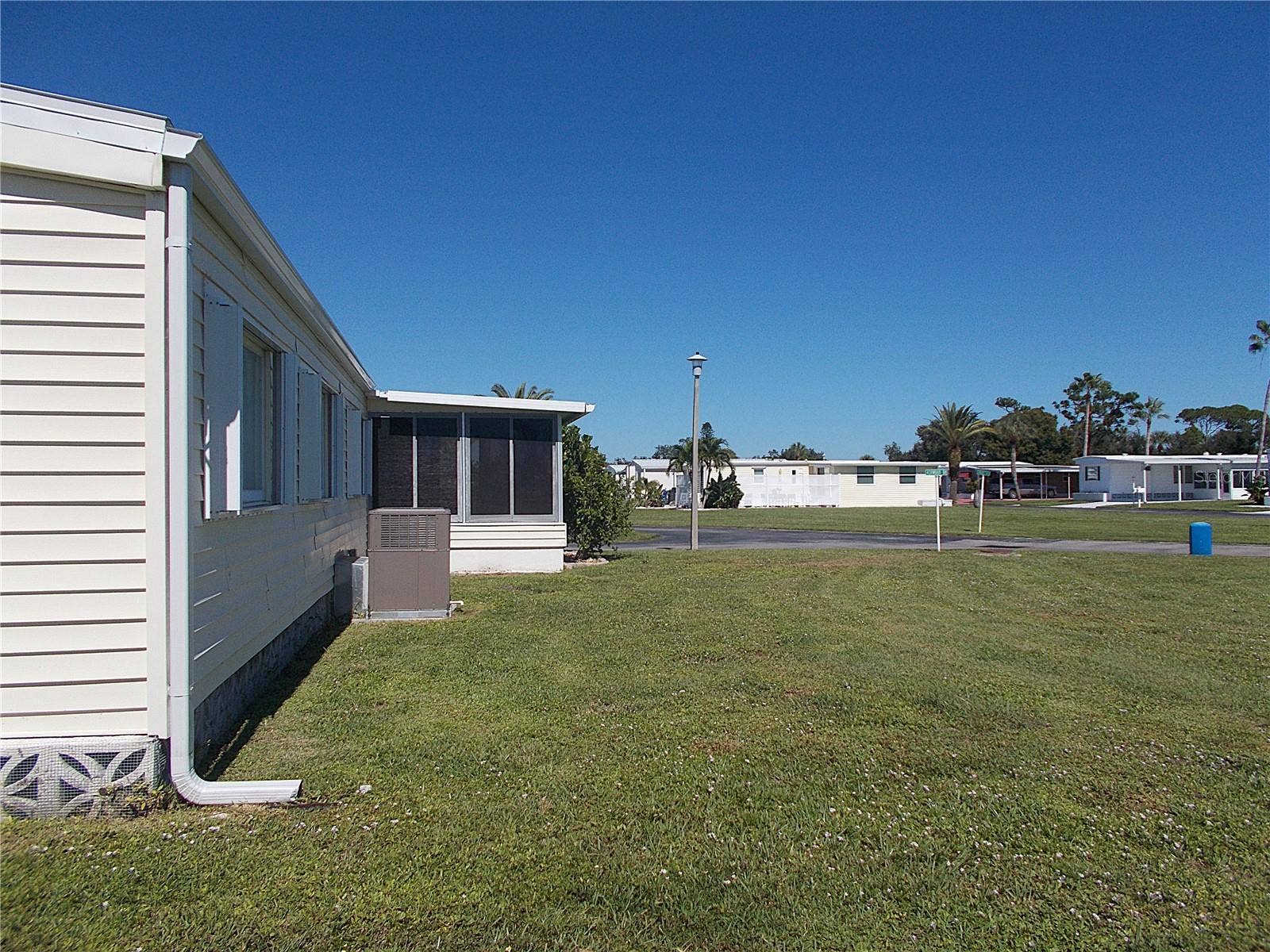 490 ASHWOOD DRIVE, Venice, FL 34285 Corner lot vantage from rear of home
