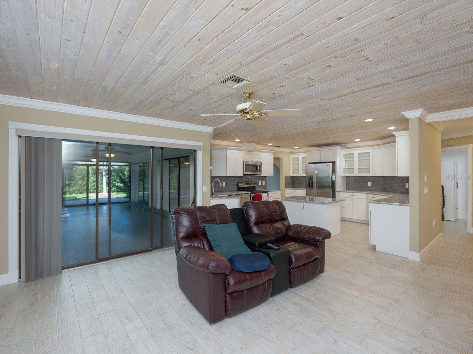 family room with slider to fl room-lanai