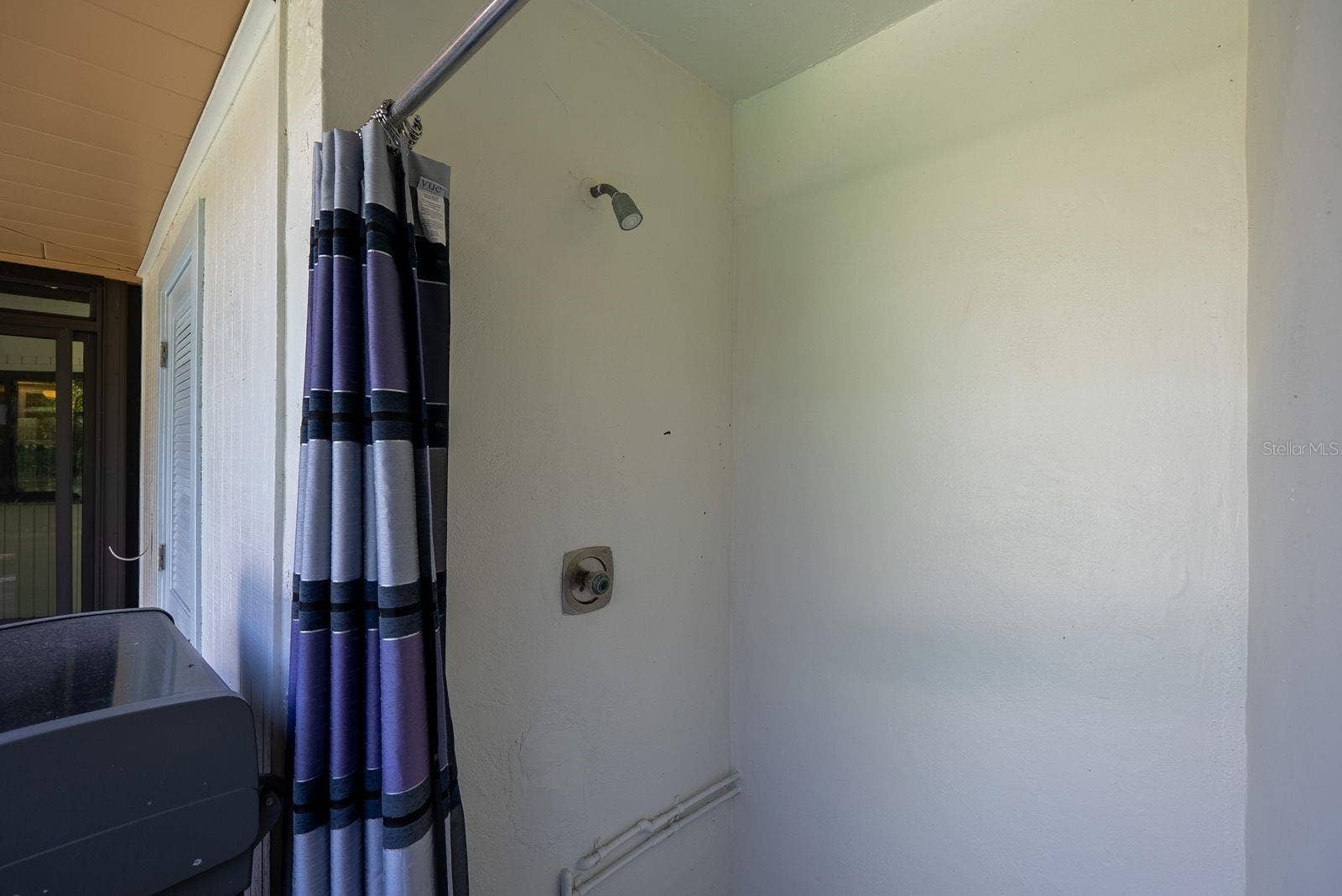 outside shower with hot and cold water