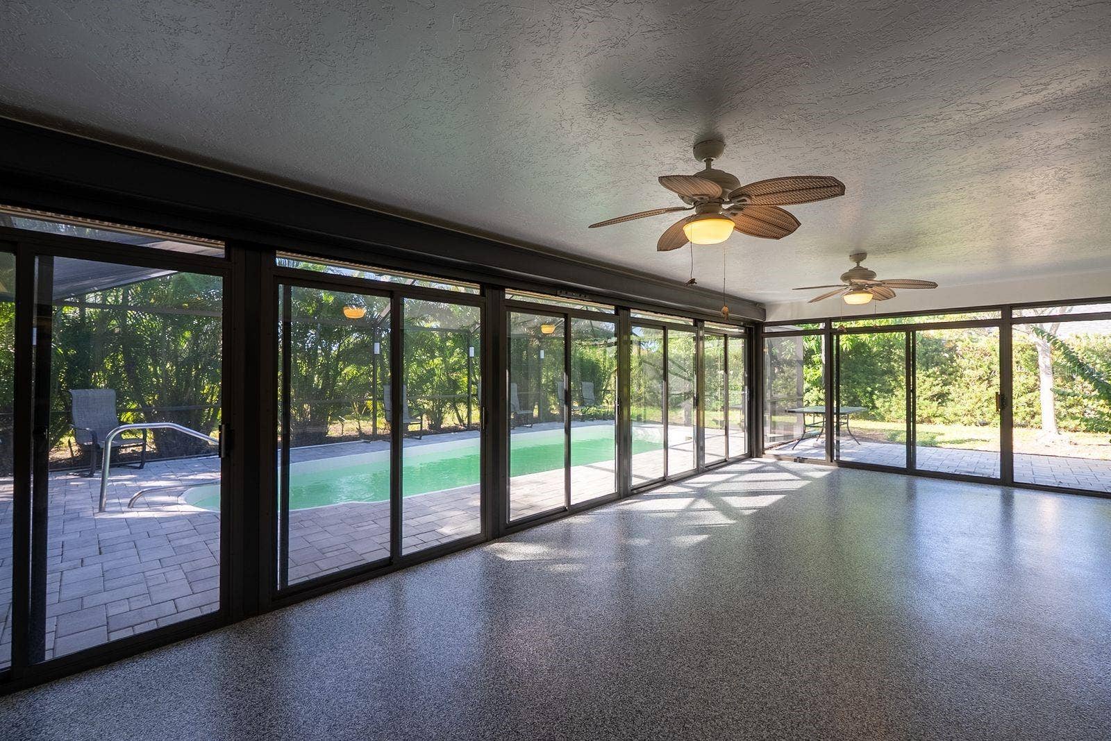 large florida room with epoxy floor
