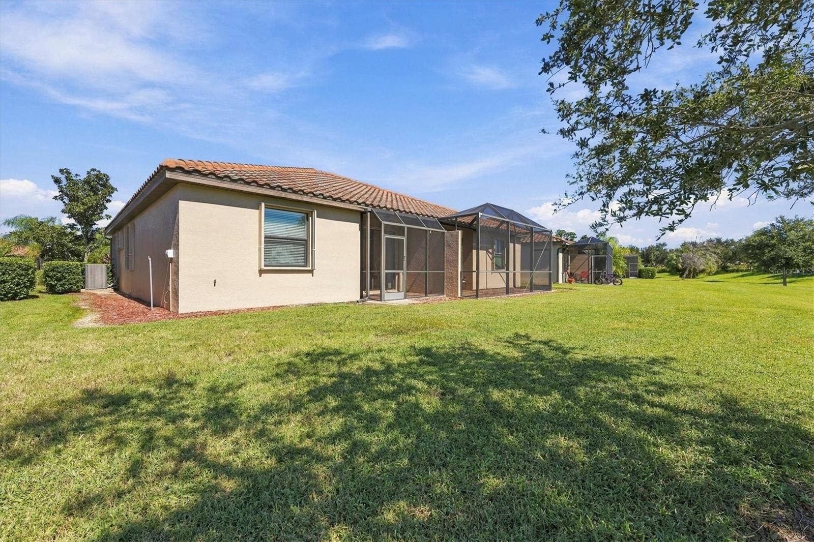 19946 BENISSIMO DRIVE, Venice, FL 34293 Expansive Rear View of Villa Grounds