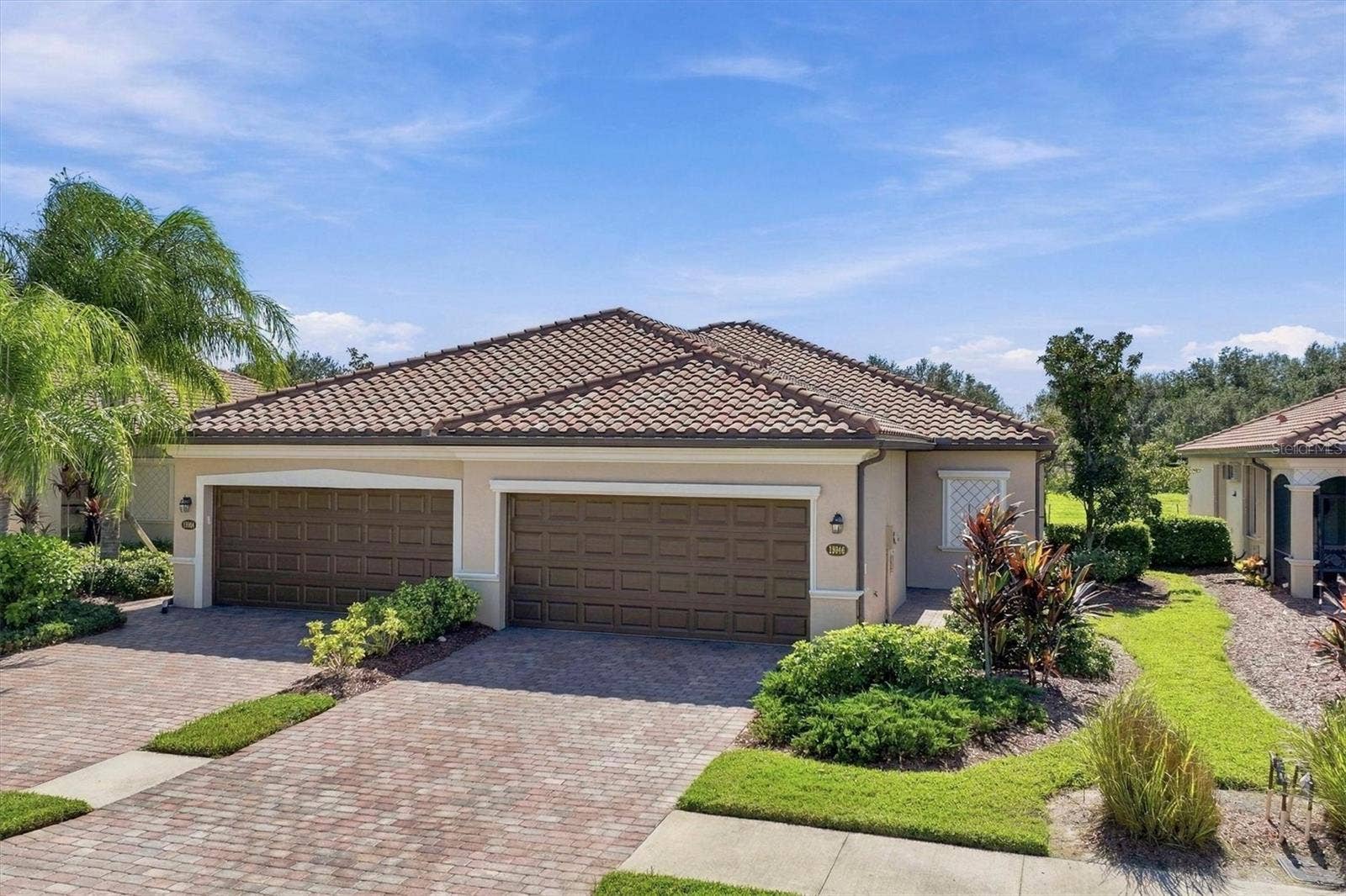 19946 BENISSIMO DRIVE, Venice, FL 34293 front of Villa (Right)
