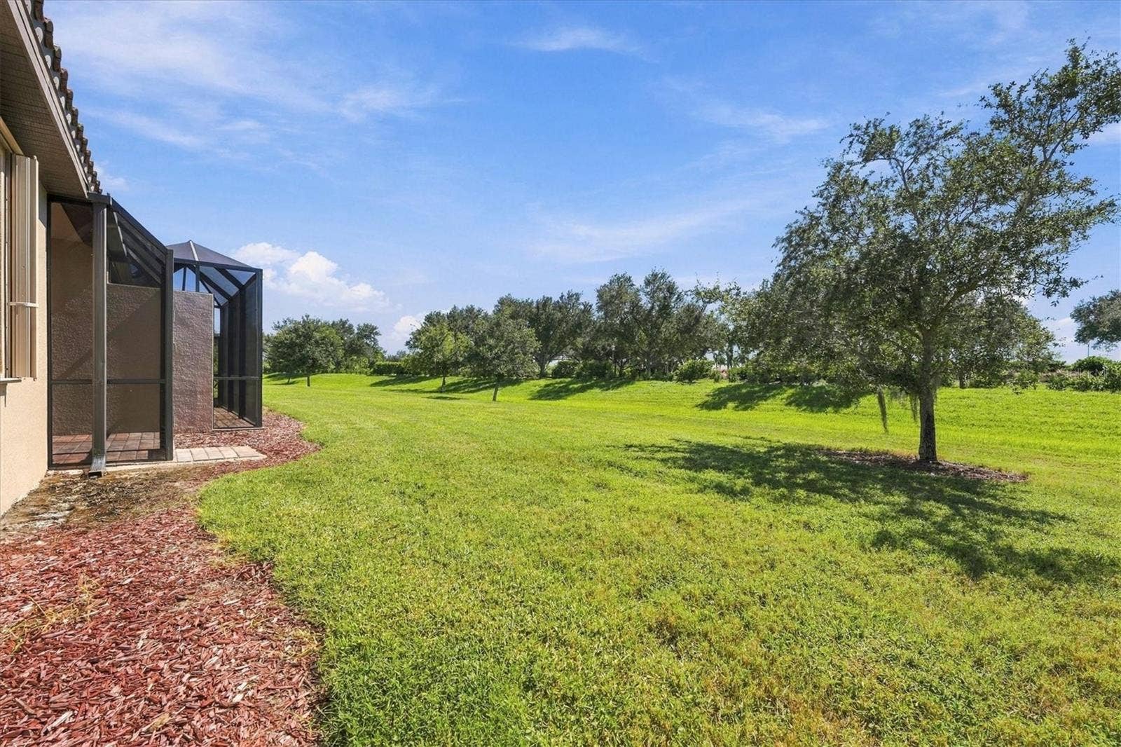 19946 BENISSIMO DRIVE, Venice, FL 34293 Expansive Rear View of Villa Grounds
