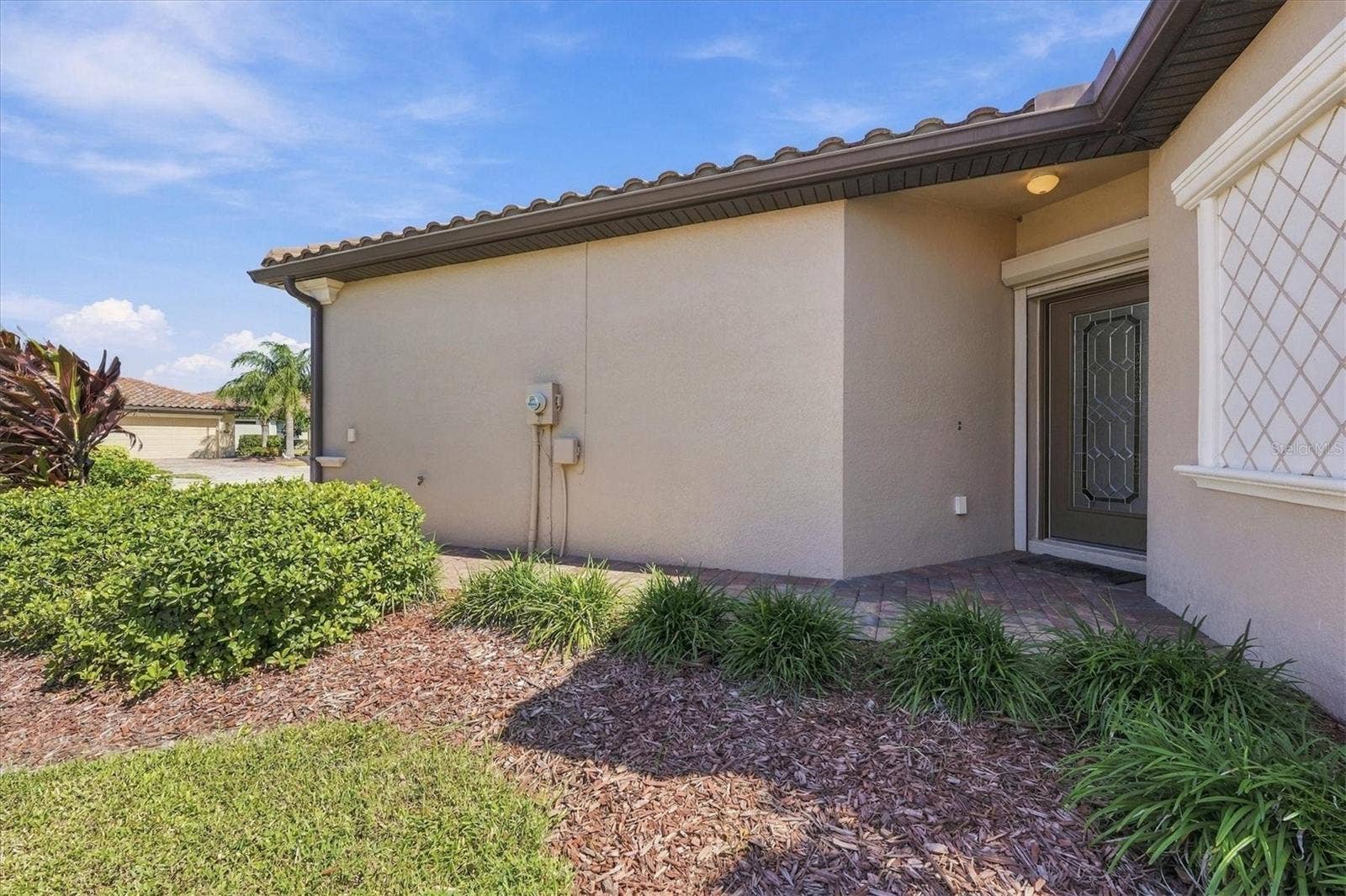 19946 BENISSIMO DRIVE, Venice, FL 34293 Side Entrance to Villa