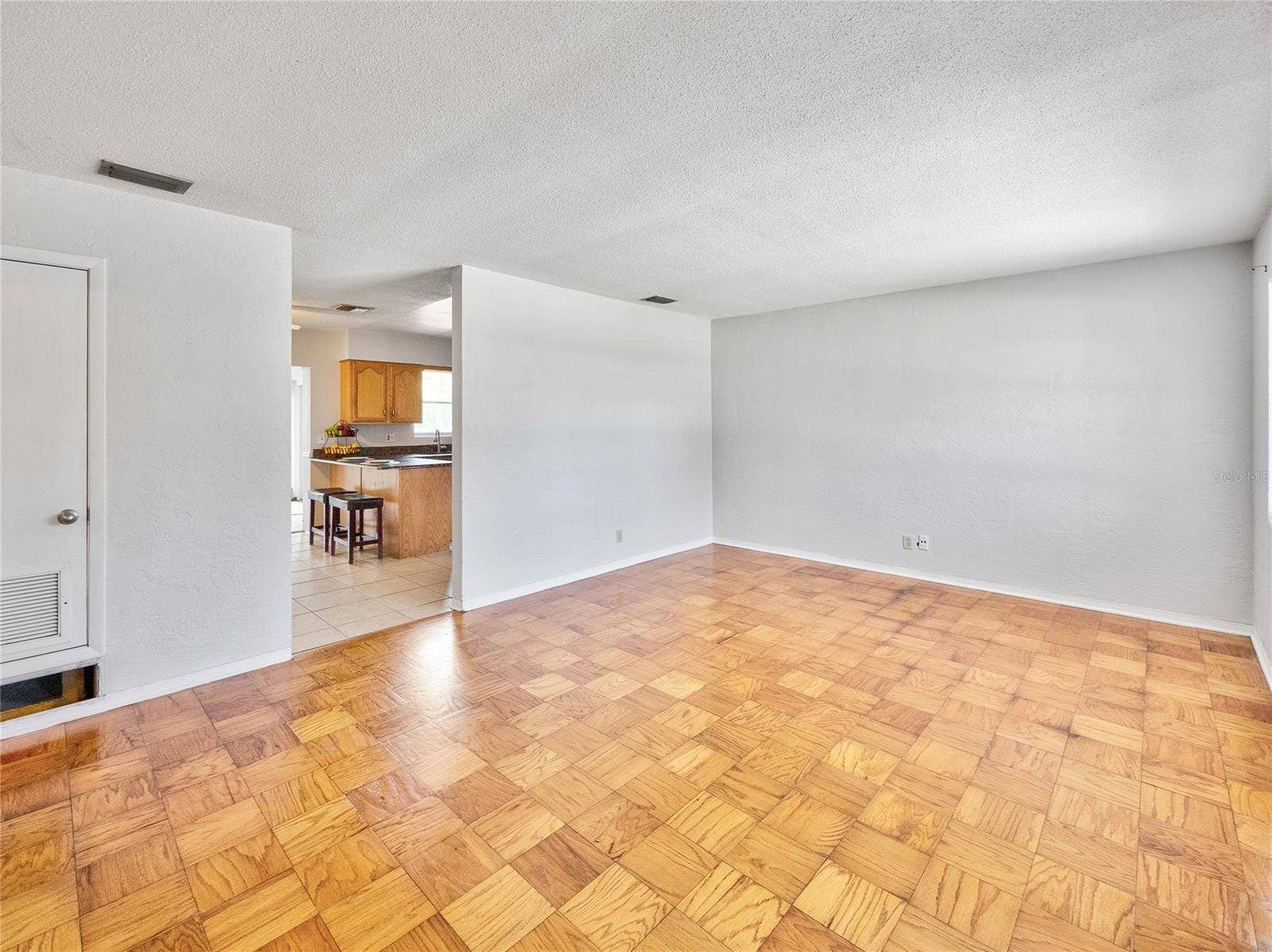 South Daytona, FL 32119 Living Room with Parquet flooring