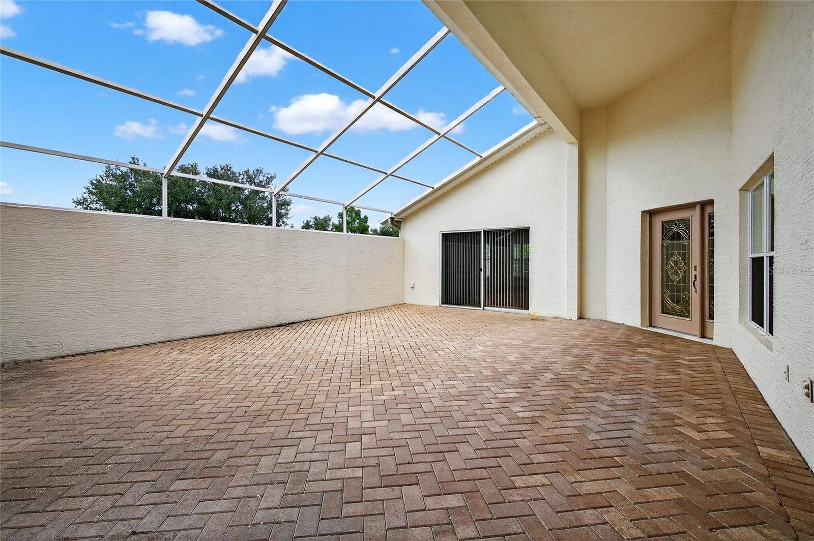 5415 SWORDFERN COURT, Port Orange, FL 32128 Courtyard to Main House