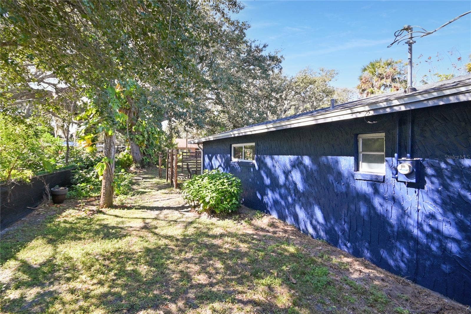 5820 RIVERSIDE DRIVE, Port Orange, FL 32127 South side yard is extra wide.
