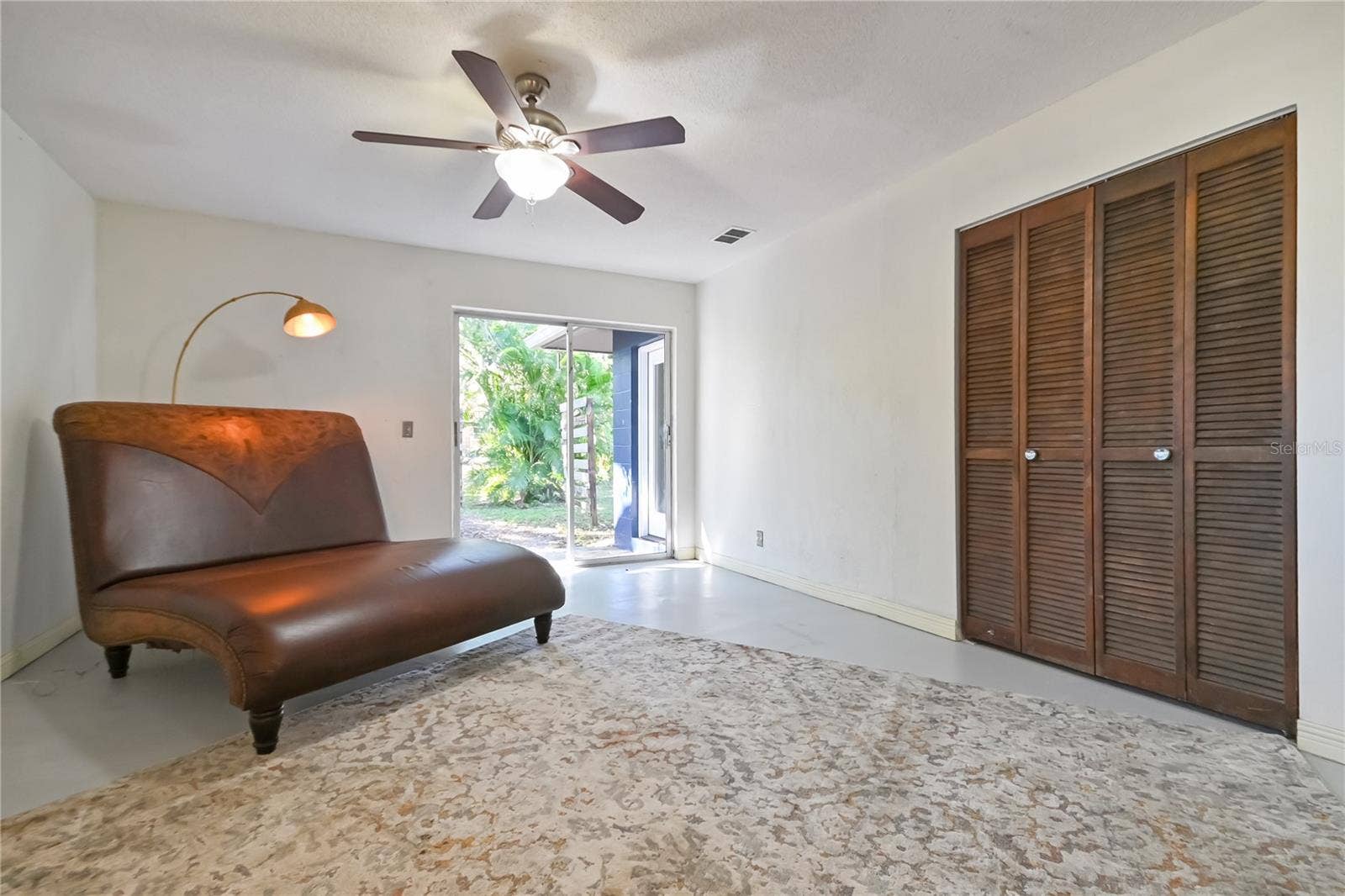 5820 RIVERSIDE DRIVE, Port Orange, FL 32127 Slider access to the back patio.