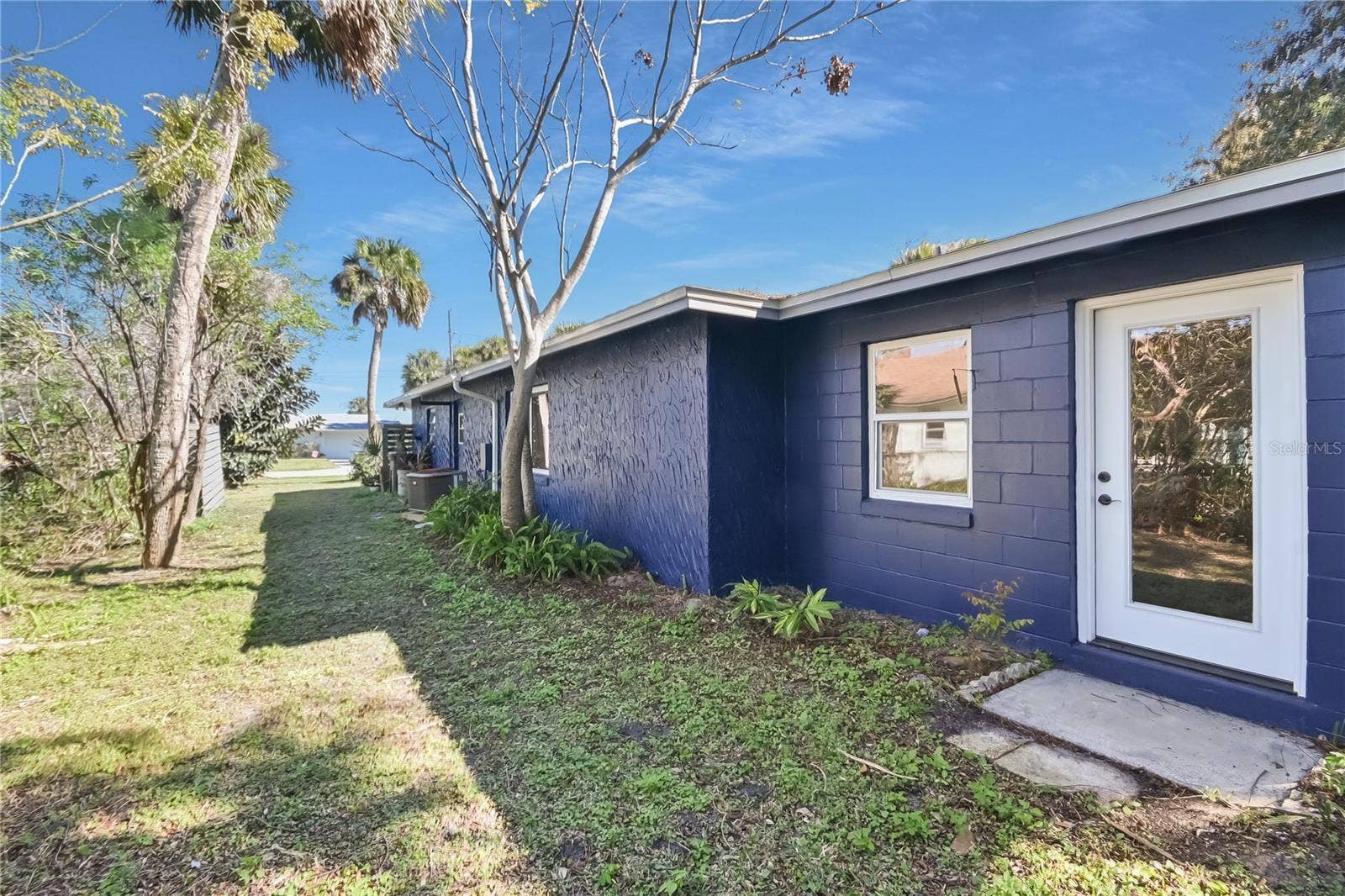 5820 RIVERSIDE DRIVE, Port Orange, FL 32127 North side yard is extra wide.
