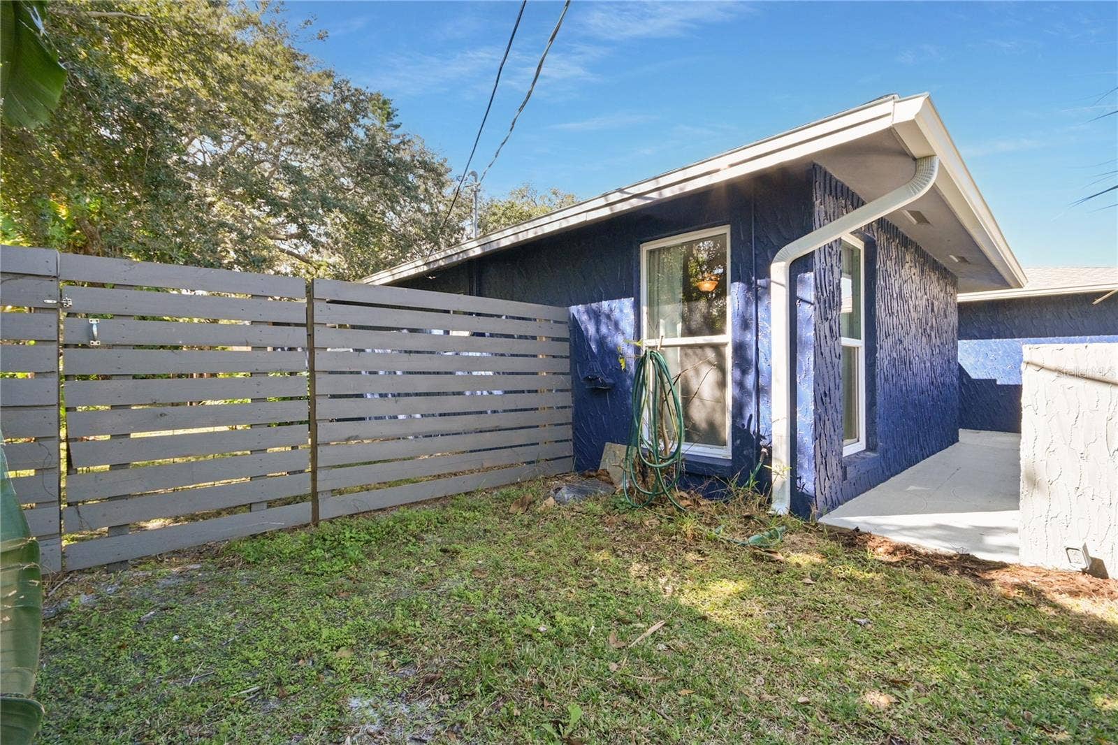5820 RIVERSIDE DRIVE, Port Orange, FL 32127 South side yard gate.