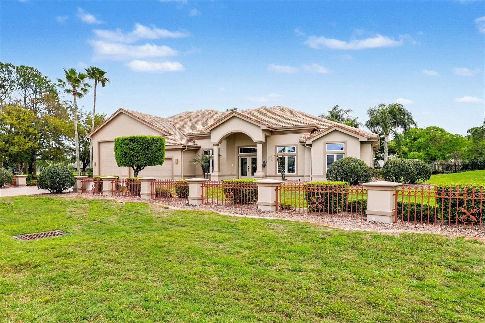 3114 SPRUCE CREEK BOULEVARD, Port Orange, FL 32128 Residence with 1700 sf garage including 50' x' 20' bay