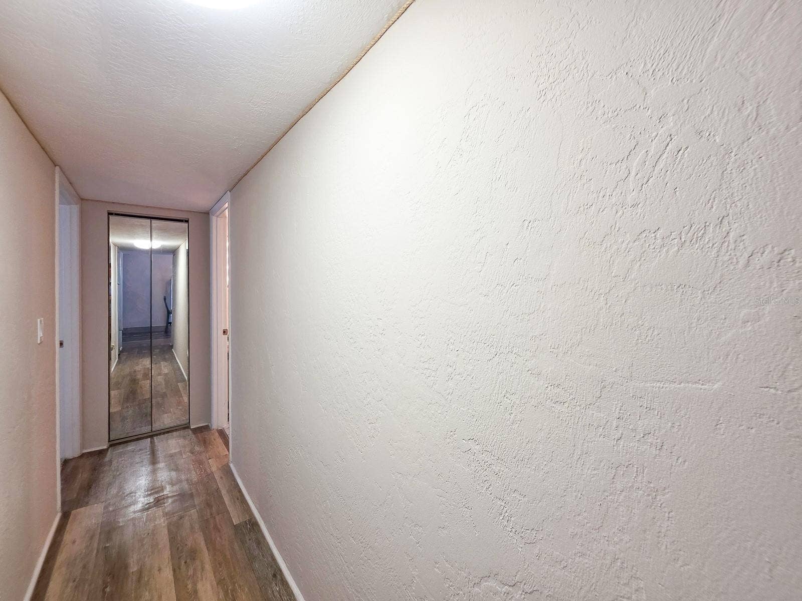 3606 S PENINSULA DRIVE, #605, Port Orange, FL 32127 Hallway to Bedrooms 2, 3 and Guest Bathroom