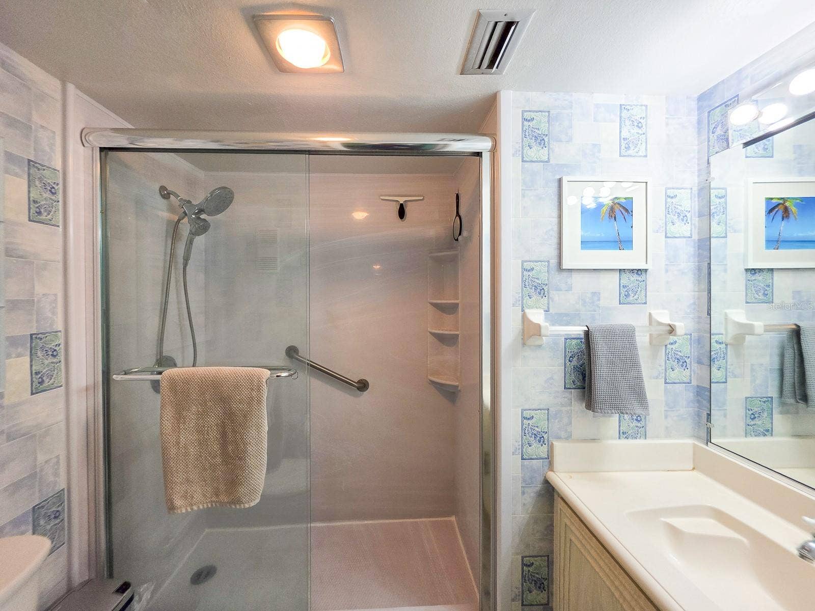 3606 S PENINSULA DRIVE, #605, Port Orange, FL 32127 Primary Ensuite Bathroom with Walk-In shower