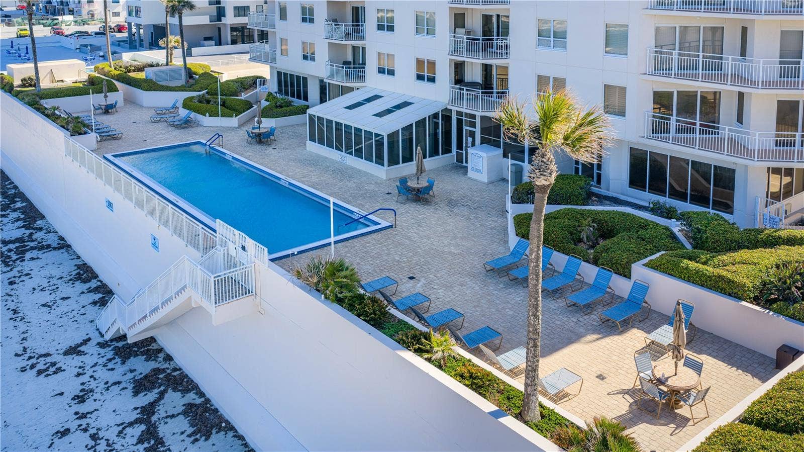 2967 S ATLANTIC AVENUE, #903, Daytona Beach Shores, FL 32118 OCEANS 6 view of Pool Deck, sitting areas