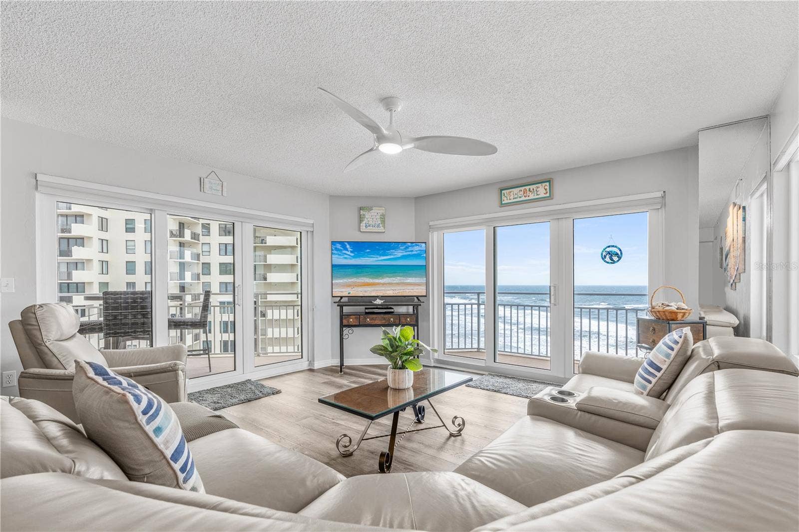 2967 S ATLANTIC AVENUE, #903, Daytona Beach Shores, FL 32118 Living with wrap balconny NE VIEW