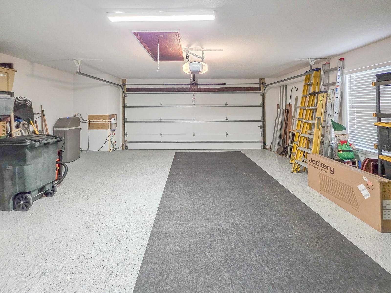 R-19 insulated garage door, Epoxy floor, whole home water filtration & water softener.