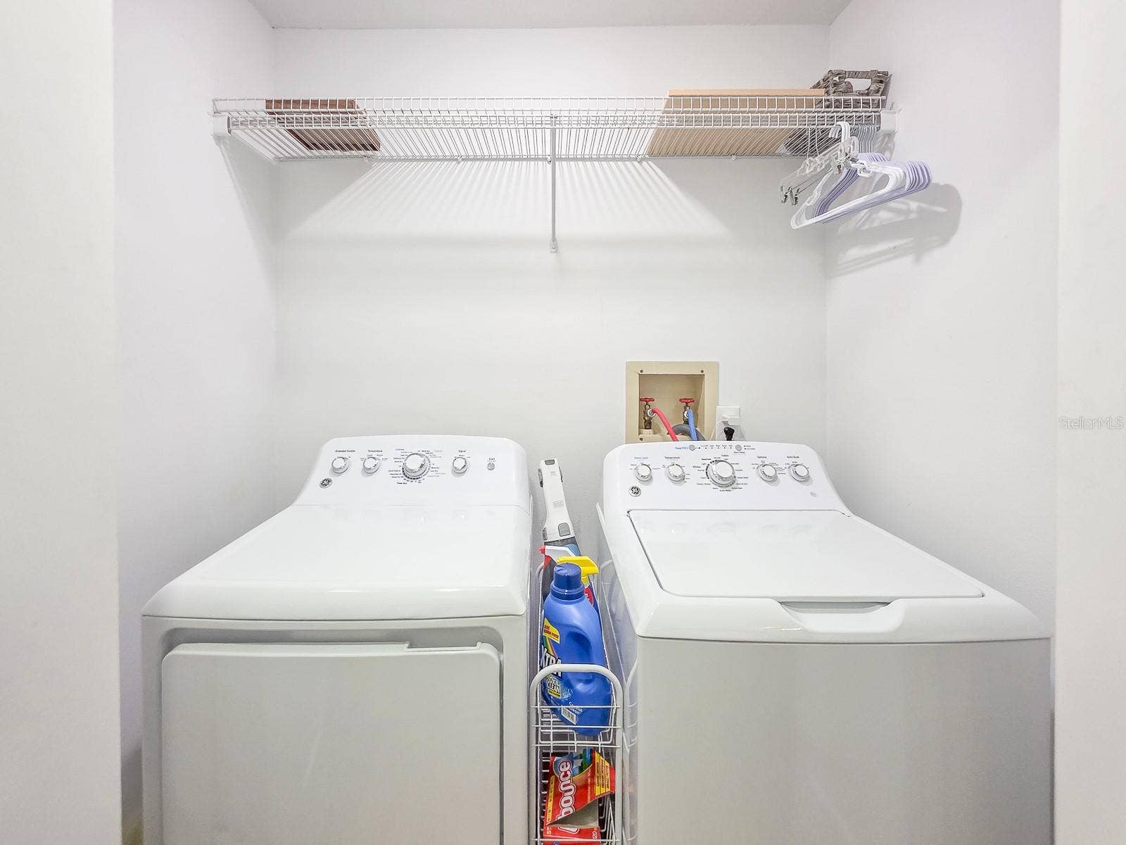 Hallway laundry closet.
