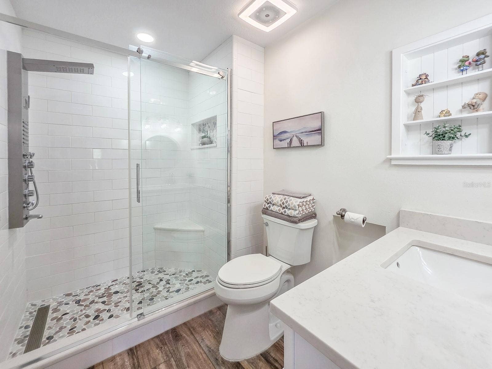 Bluetooth/LED Exhaust Fan, Kohler taller toilet, built in shelvling.