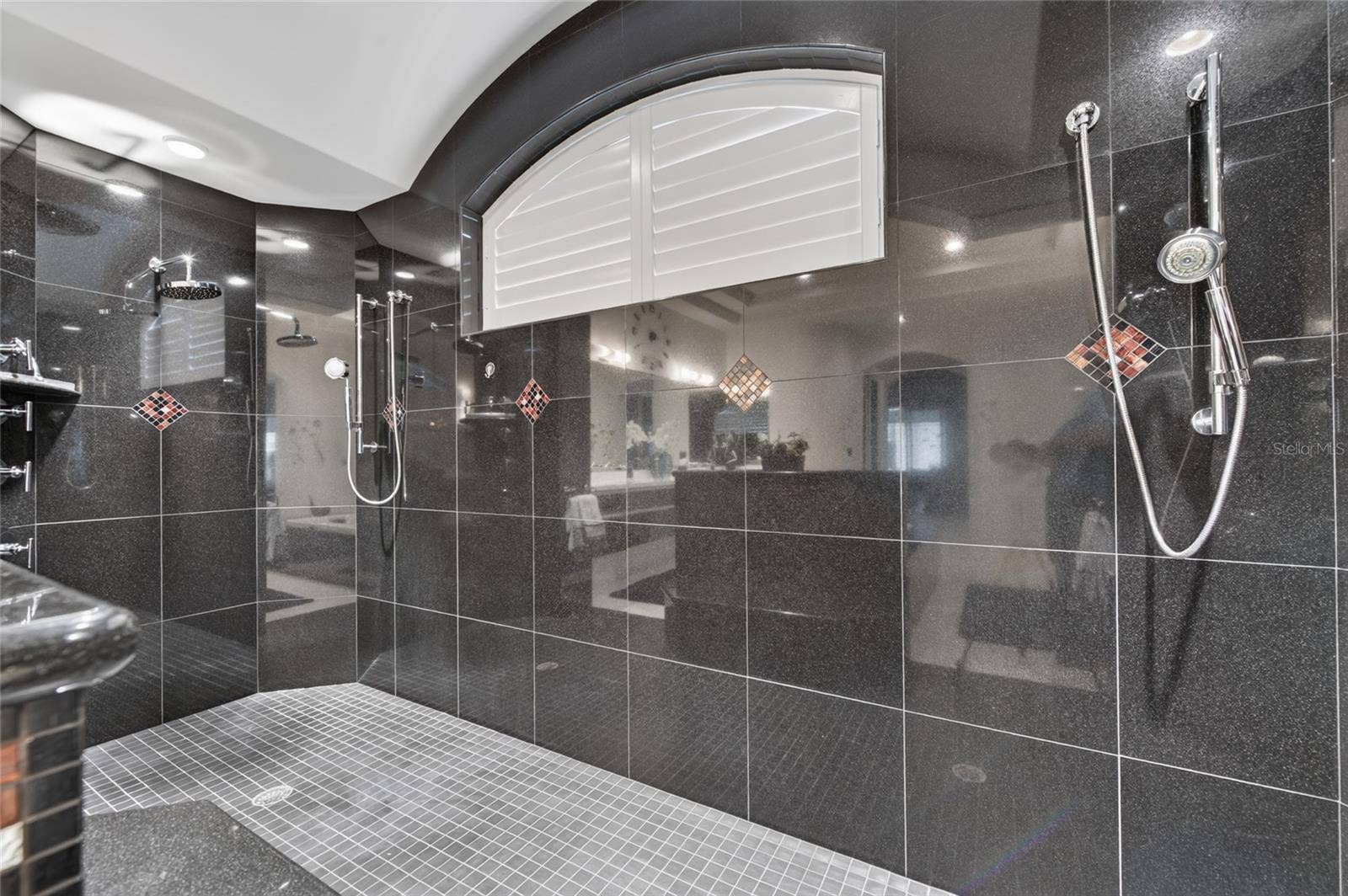 TWO SHOWER HEADS