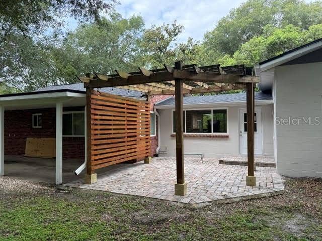 SIDE PAVER DECKWITH PERGOLA