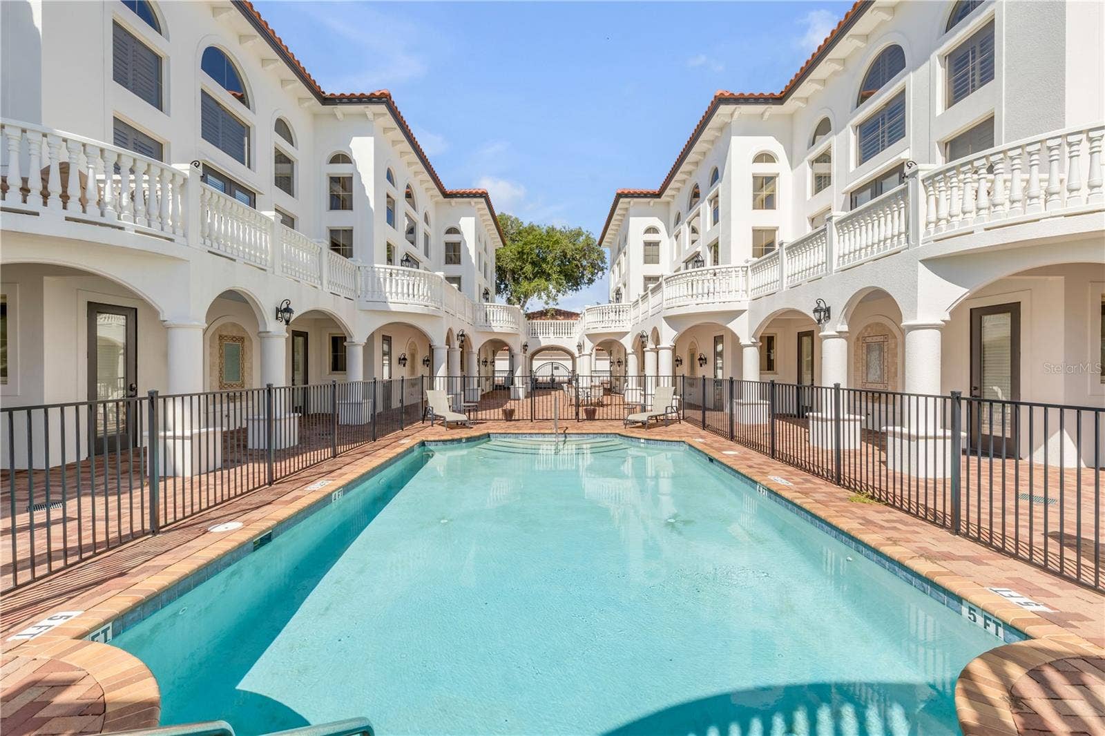5090 RIVERSIDE DRIVE, #105, Port Orange, FL 32127 pool looking toward the west