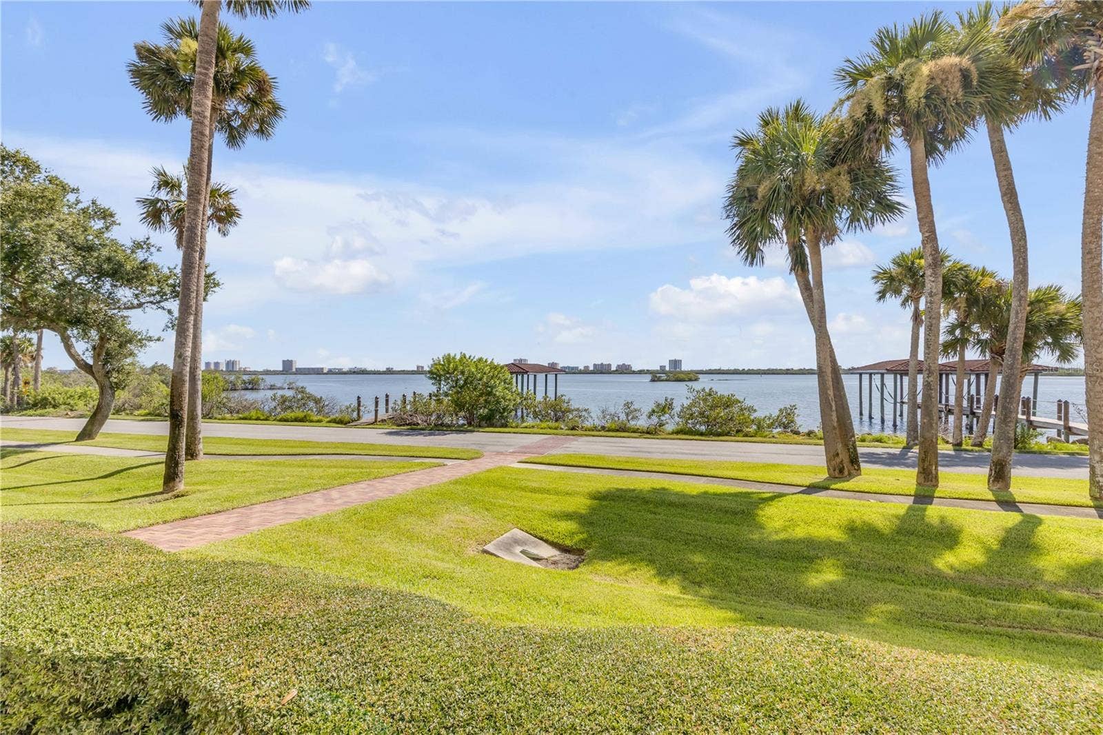 5090 RIVERSIDE DRIVE, #105, Port Orange, FL 32127 views of the Halifax River from the pool area.