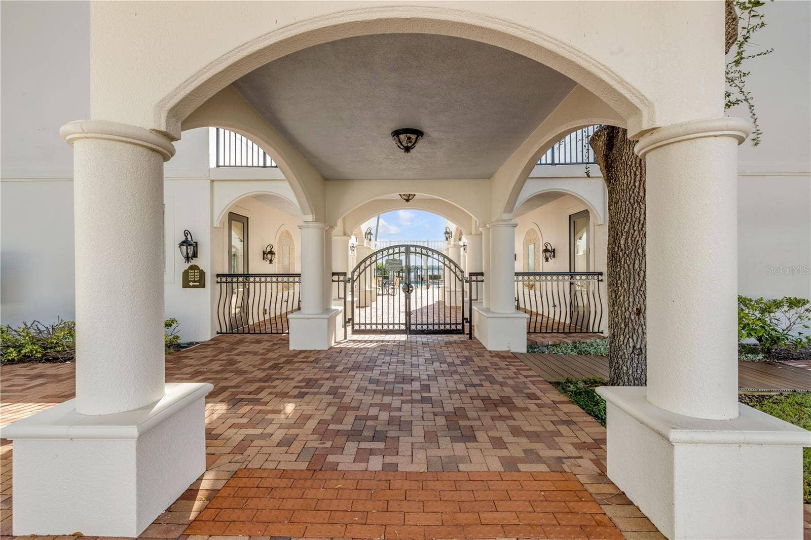 5090 RIVERSIDE DRIVE, #105, Port Orange, FL 32127 Gated entrance to Pool & Courtyard