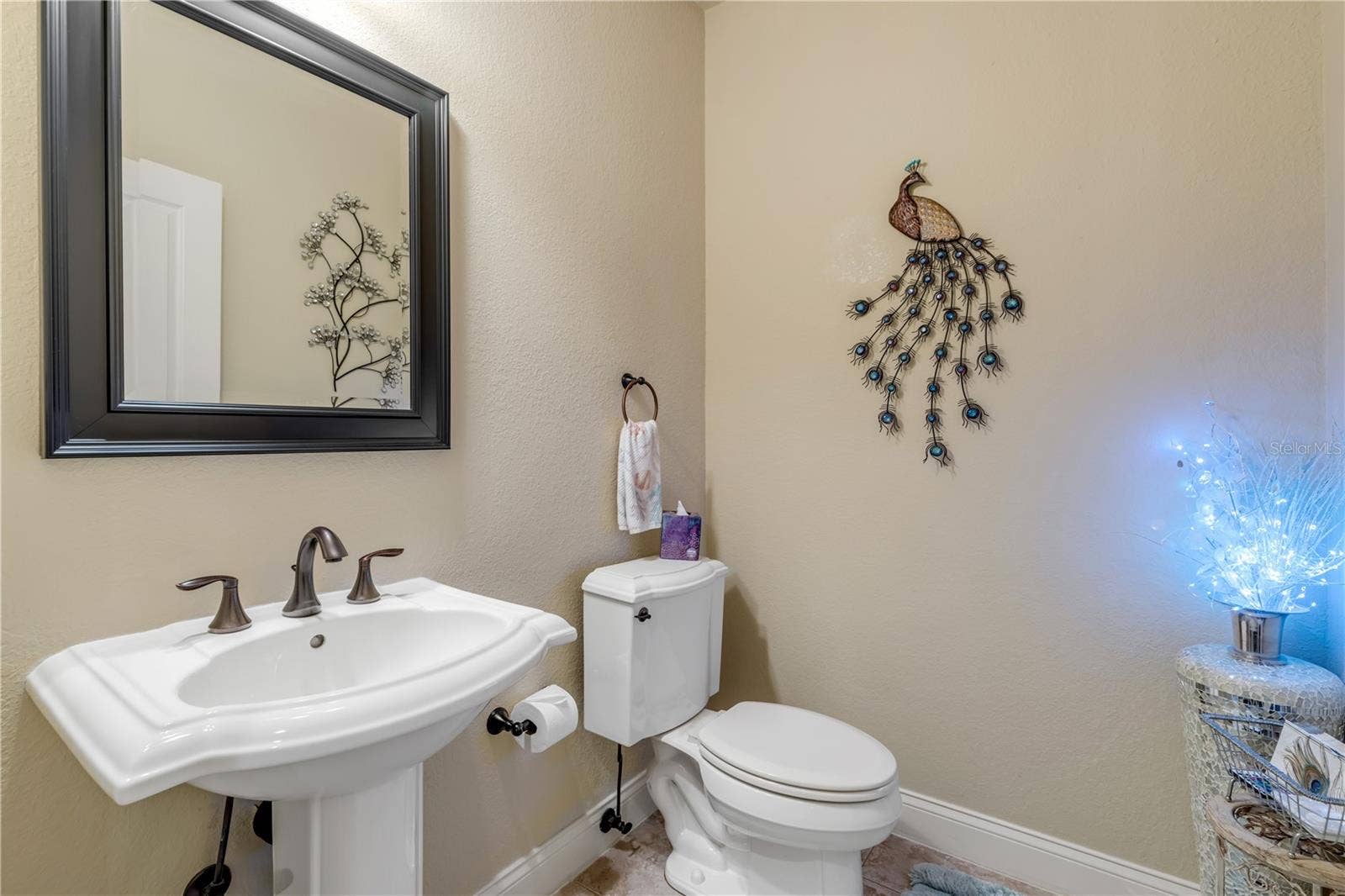 5090 RIVERSIDE DRIVE, #105, Port Orange, FL 32127 powder room on main level for guests