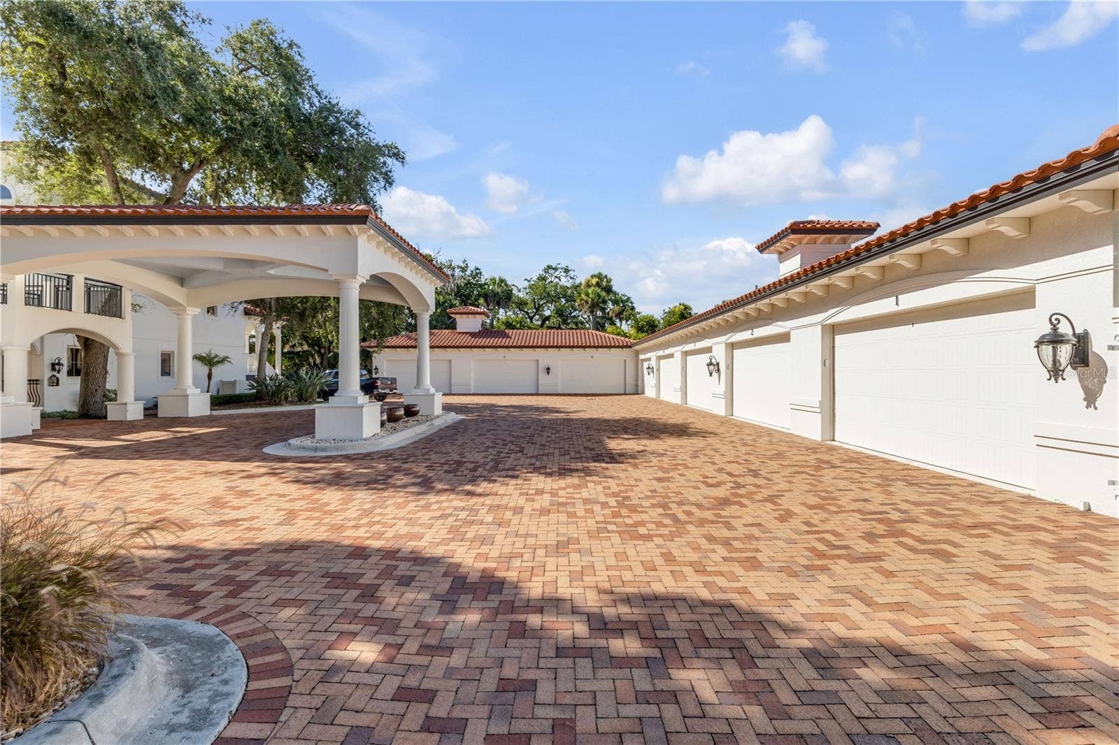 5090 RIVERSIDE DRIVE, #105, Port Orange, FL 32127 Paver parking lot, private garage, portico