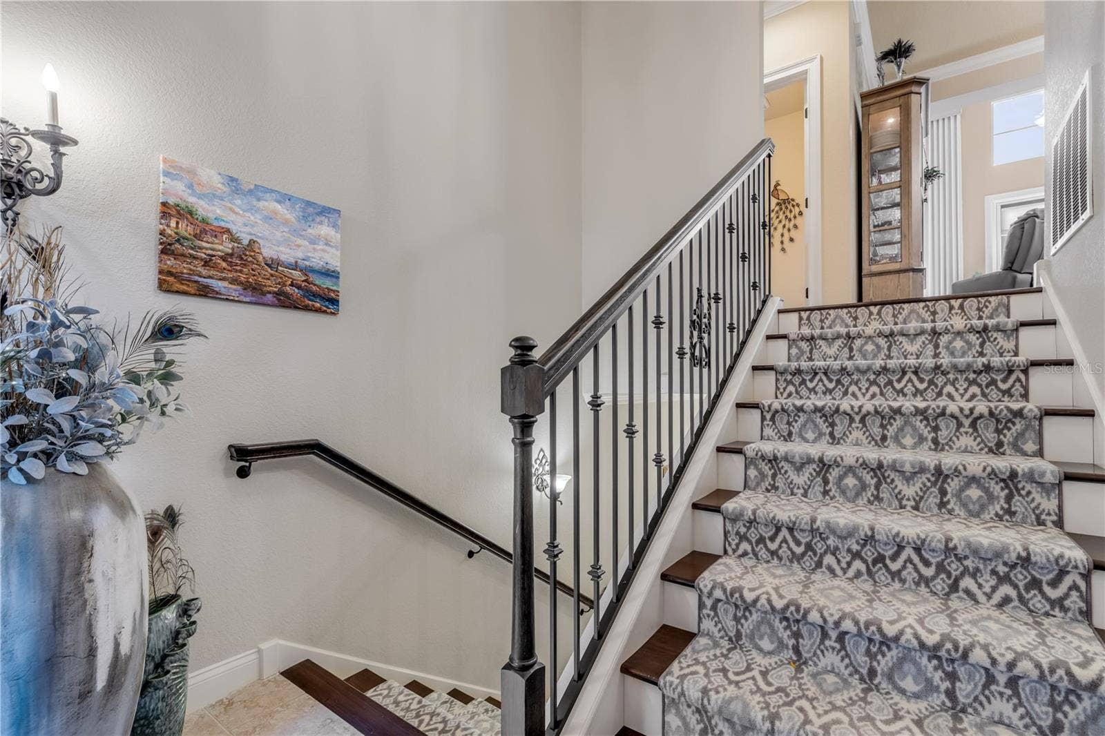 5090 RIVERSIDE DRIVE, #105, Port Orange, FL 32127 Go up for common area (Kitchen/dining/living)Go down for 2 guest bedrooms, guest bathroom, laundry room, and office