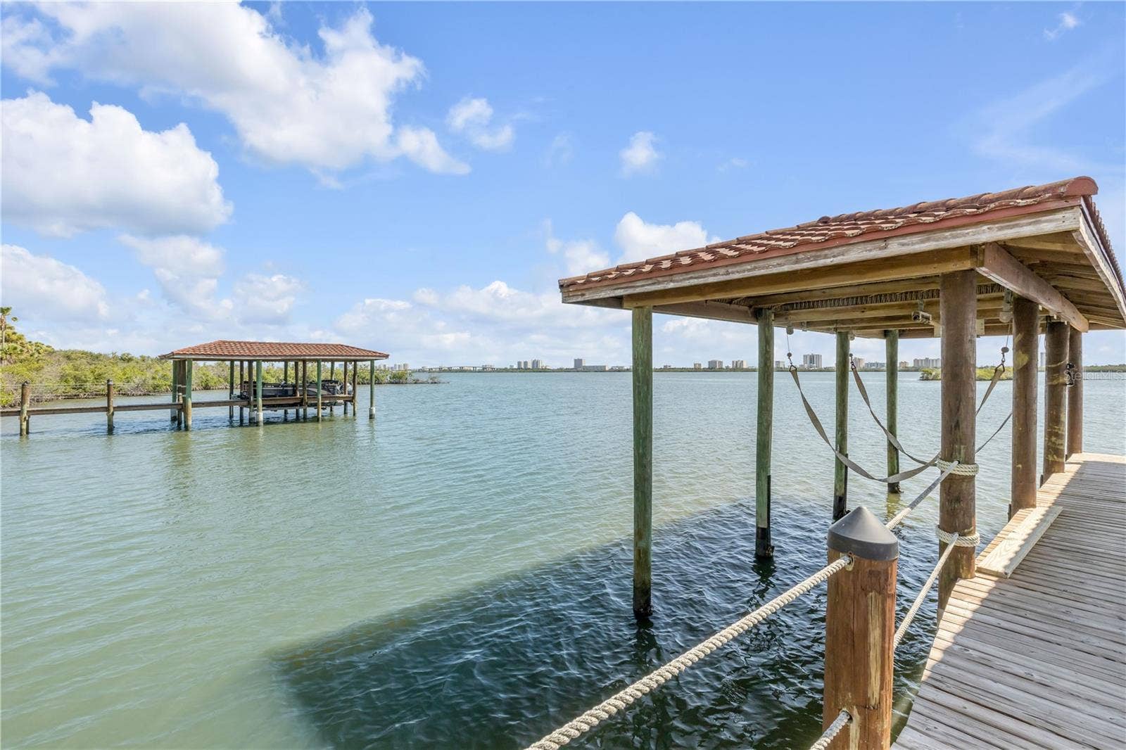 5090 RIVERSIDE DRIVE, #105, Port Orange, FL 32127 Water is approx 3 feet deep at the dock