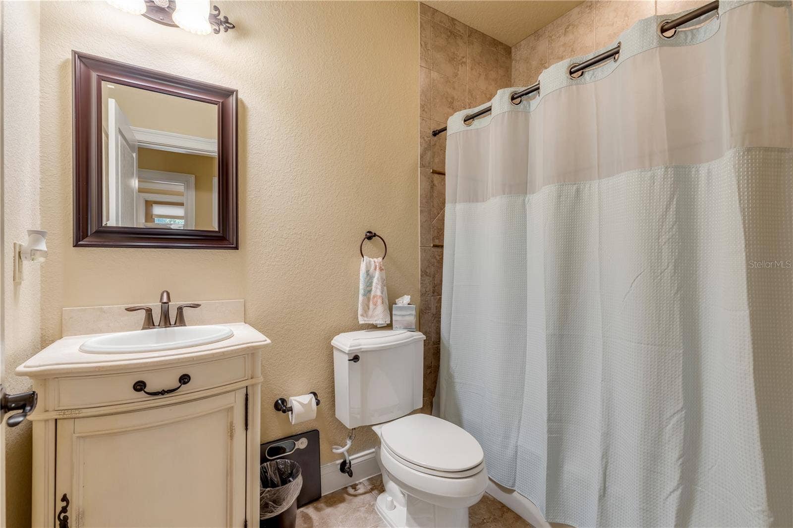5090 RIVERSIDE DRIVE, #105, Port Orange, FL 32127 Full bathroom downstairs for guest bedrooms