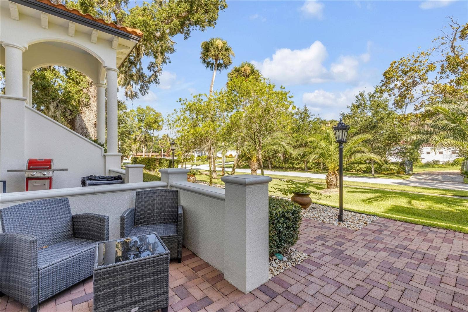 5090 RIVERSIDE DRIVE, #105, Port Orange, FL 32127 Private front courtyard