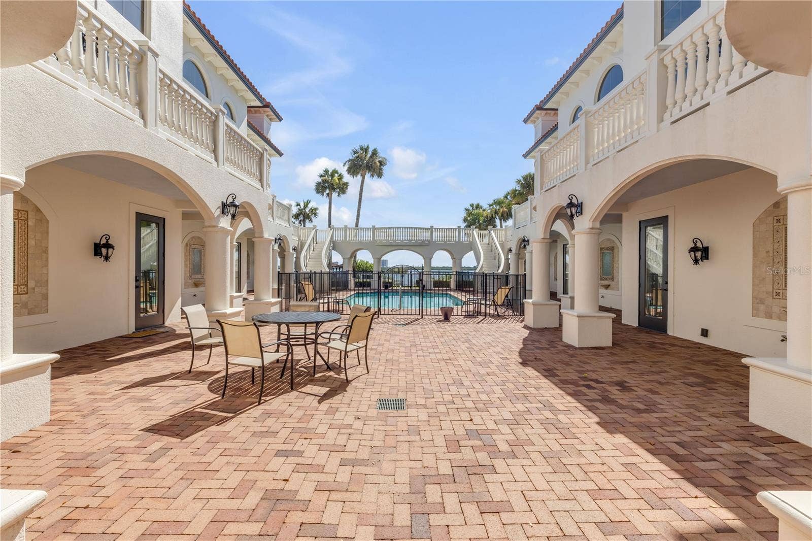 5090 RIVERSIDE DRIVE, #105, Port Orange, FL 32127 Courtyard looking toward the east.