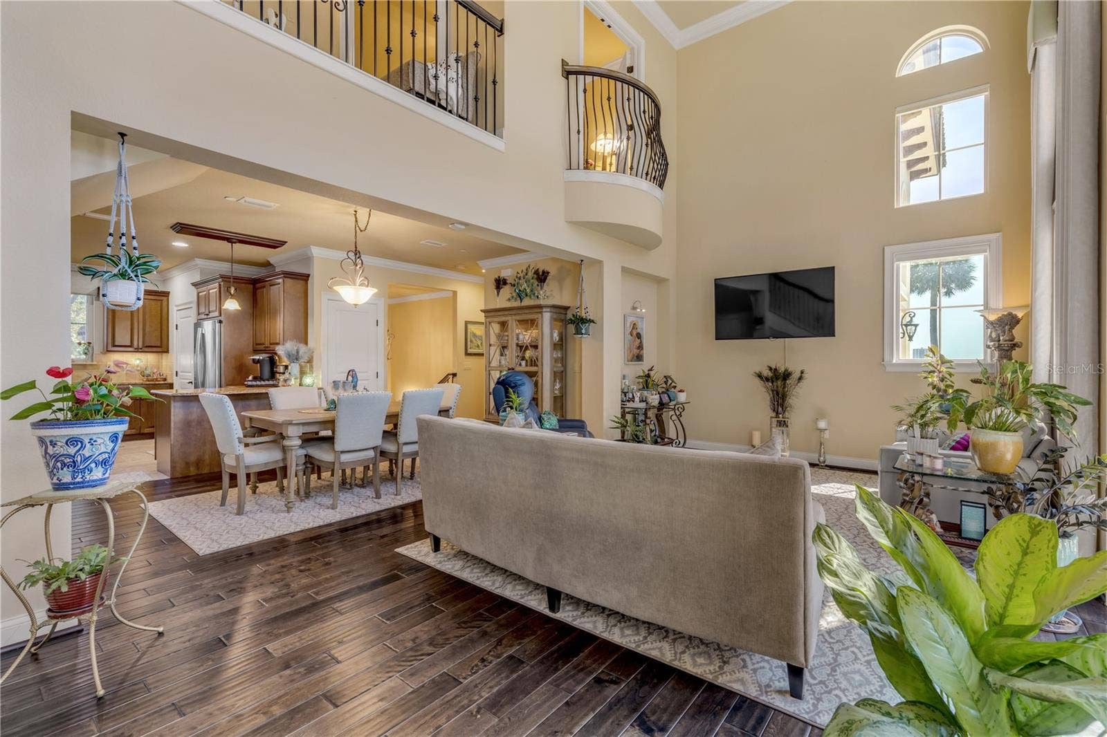 5090 RIVERSIDE DRIVE, #105, Port Orange, FL 32127 juliet balcony from the primary bedroom overlooks the living room