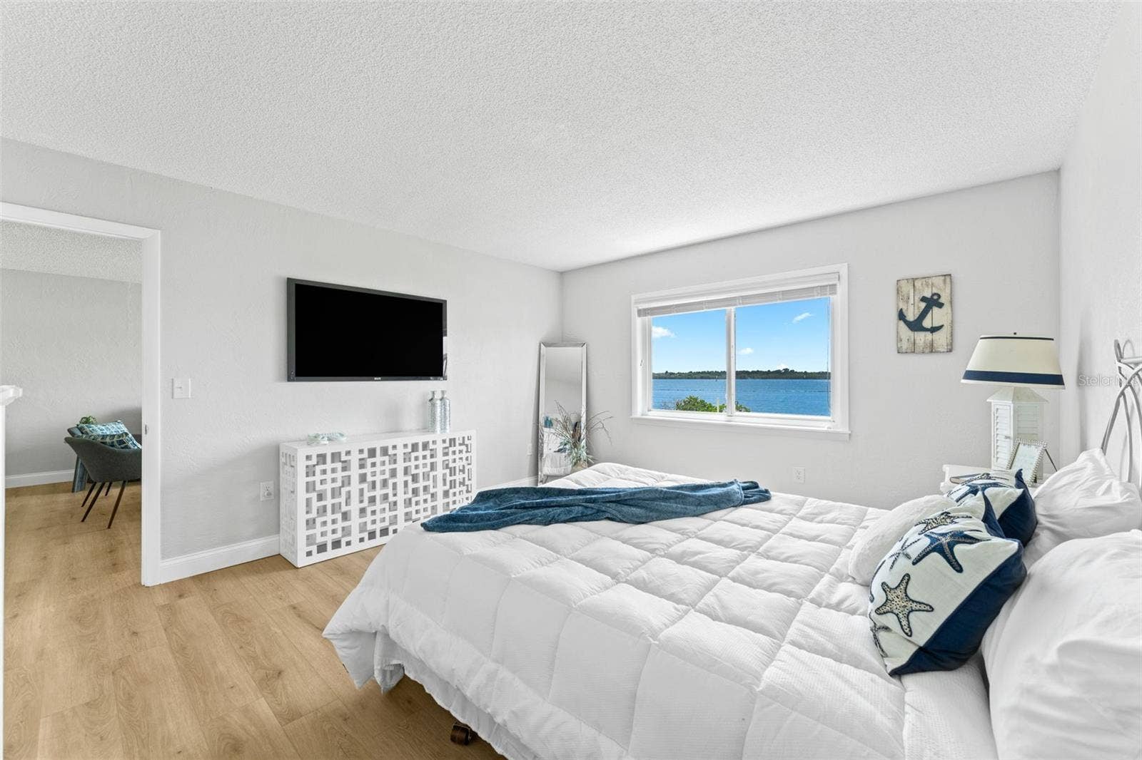 3606 S PENINSULA DRIVE, #102, Port Orange, FL 32127 Primary bedroom... what a view.