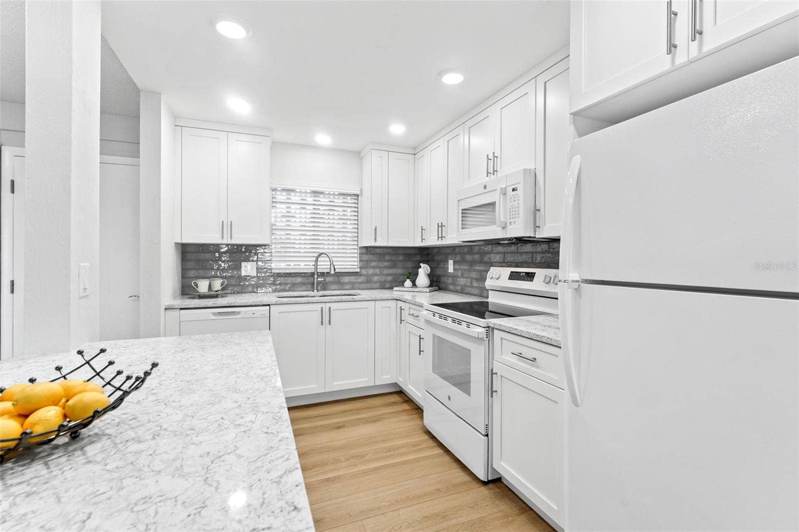 3606 S PENINSULA DRIVE, #102, Port Orange, FL 32127 Cambria quartz countertops throughout.