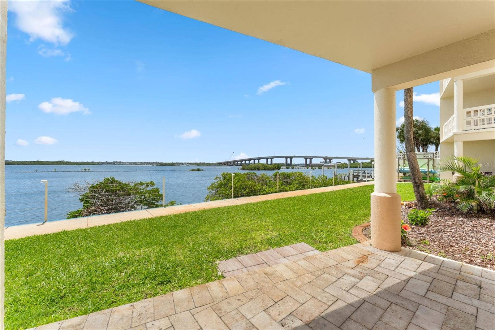 3606 S PENINSULA DRIVE, #102, Port Orange, FL 32127 Beautifully pavered lanai with a view right on the water.