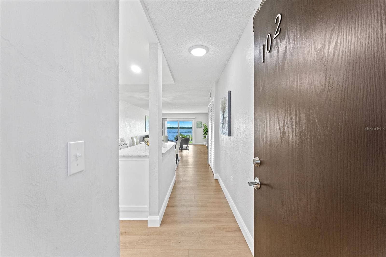 3606 S PENINSULA DRIVE, #102, Port Orange, FL 32127 Welcome to unit #102. Side, lobby and even back patio entry.
