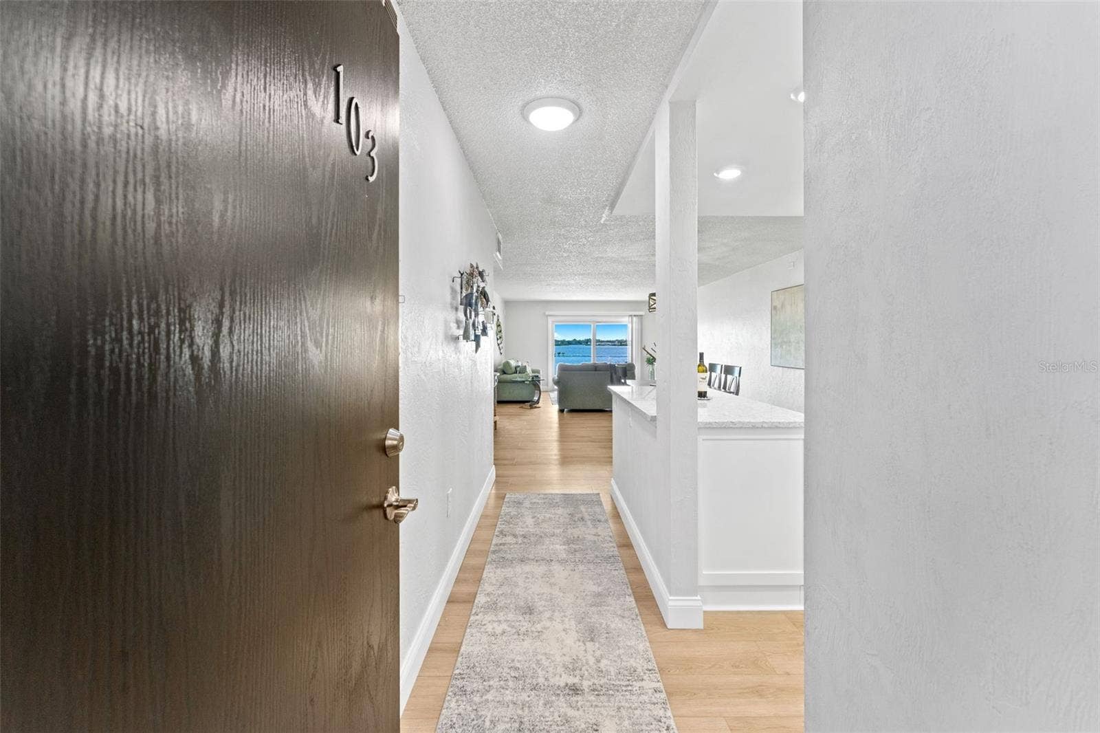 3606 S PENINSULA DRIVE, #103, Port Orange, FL 32127 Welcome & come on in to unit #103- no elevators or stairs needed.