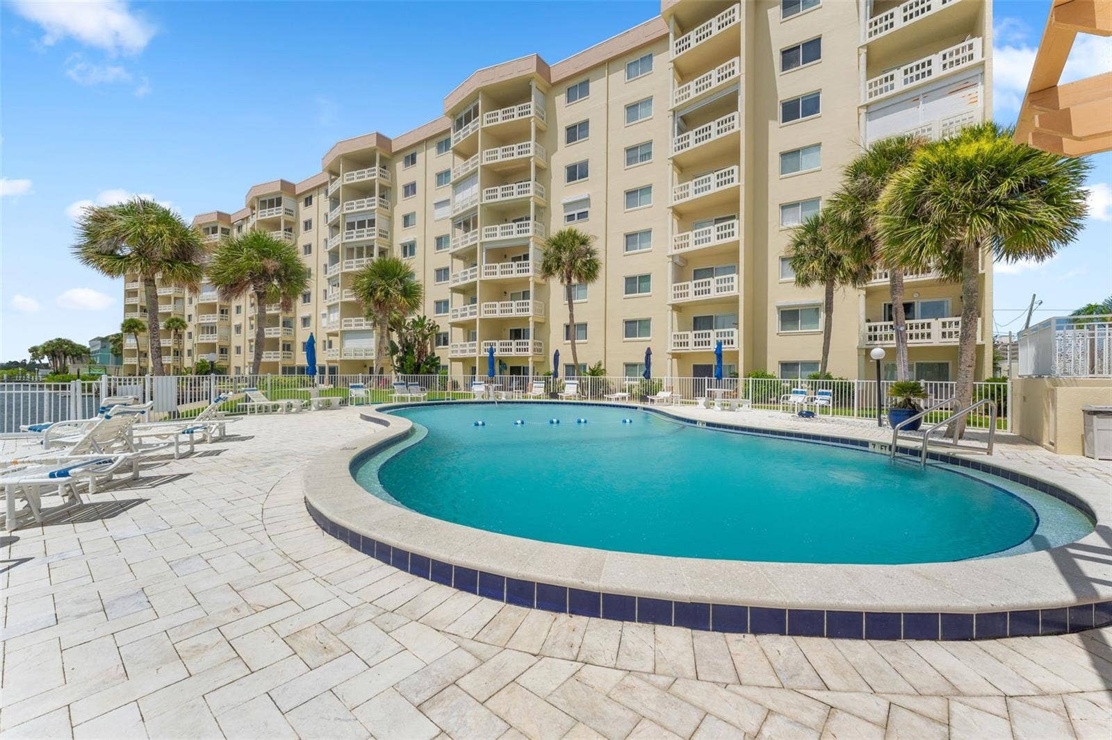 3606 S PENINSULA DRIVE, #103, Port Orange, FL 32127 Heated pool view to the north