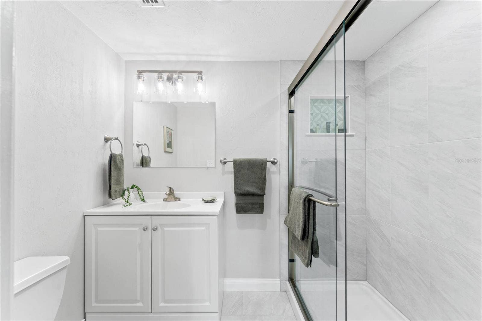 3606 S PENINSULA DRIVE, #103, Port Orange, FL 32127 Primary bathroom with walk-in shower