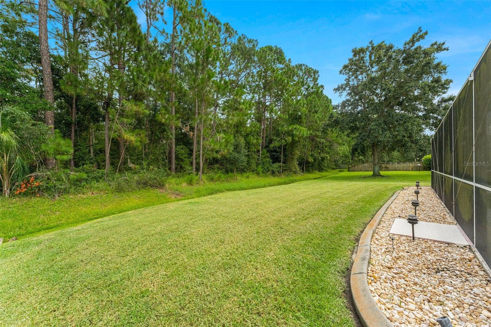 Private wooded backdrop